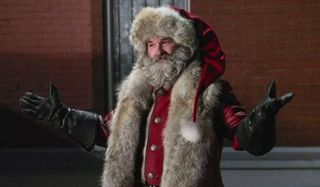 The Christmas Chronicles Kurt Russell stands confidently as Santa