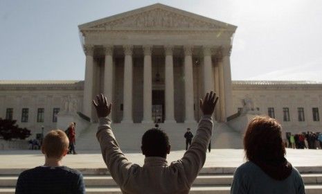 ObamaCare protesters outside the Supreme Court: Thanks, in part, to a recent series of highly politicized hearings, the Supreme Court is losing support among Americans.