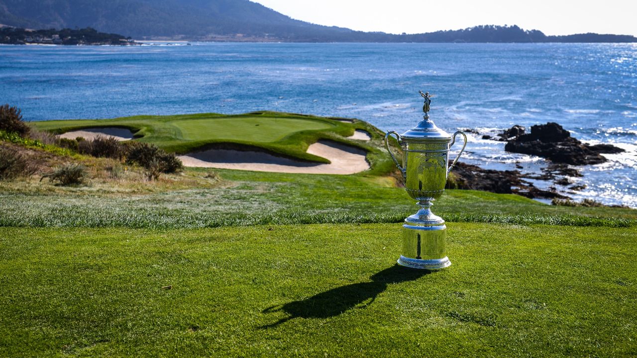 The US Open trophy on the seventh hole tee box at Pebble Beach