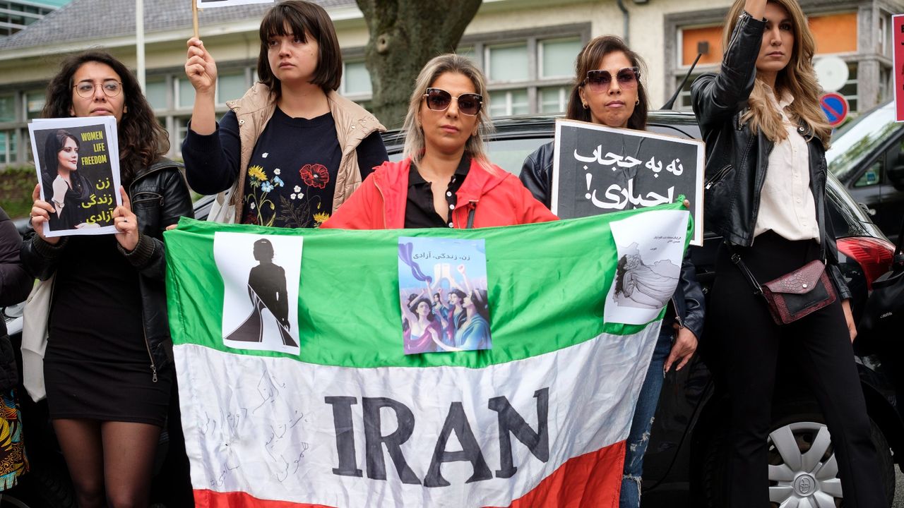 About 100 persons, mainly women, demonstrate on the Avenue Franklin Roosvelt, in front of the Iranian embassy to protest against the murder of Zhina Amini on September 23, 2022 in Brussels, Belgium. Mahsa (Zhina Amini) was brutally murdered by the morality police for wearing her hijab improperly. 