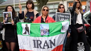 About 100 persons, mainly women, demonstrate on the Avenue Franklin Roosvelt, in front of the Iranian embassy to protest against the murder of Zhina Amini on September 23, 2022 in Brussels, Belgium. Mahsa (Zhina Amini) was brutally murdered by the morality police for wearing her hijab improperly.