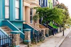 Street with colourful townhouses in Notting Hill, London, UK