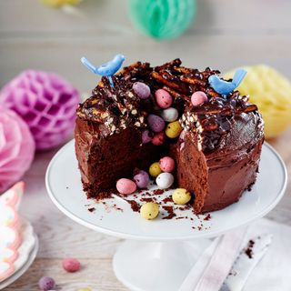 chocolate cake with plate and candies