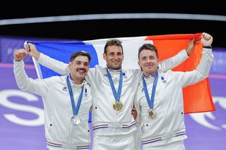 BMX Racing Final - Joris Daudet (France) on the podium receiving the gold medal after winning the Men's BMX Racing Final to become Olympic Champion with Sylvain Andre (France) receives the Olympic Silver Medal and Romain Mahieu (France) receives the Olympic Bronze Medal making it a all French podium