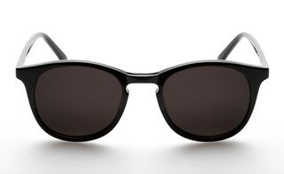 Black oval framed glasses with black tinted lenses.