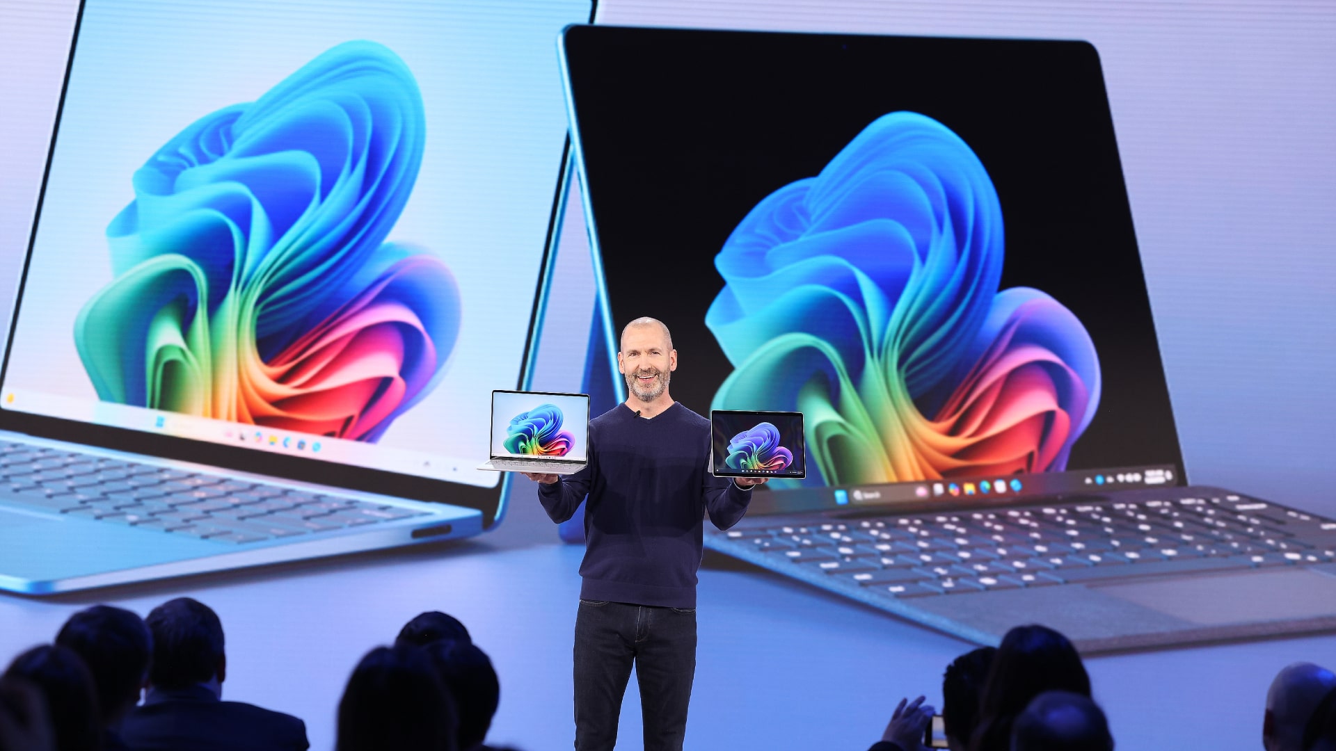Microsoft presenting Surface Laptop and Surface Pro devices.