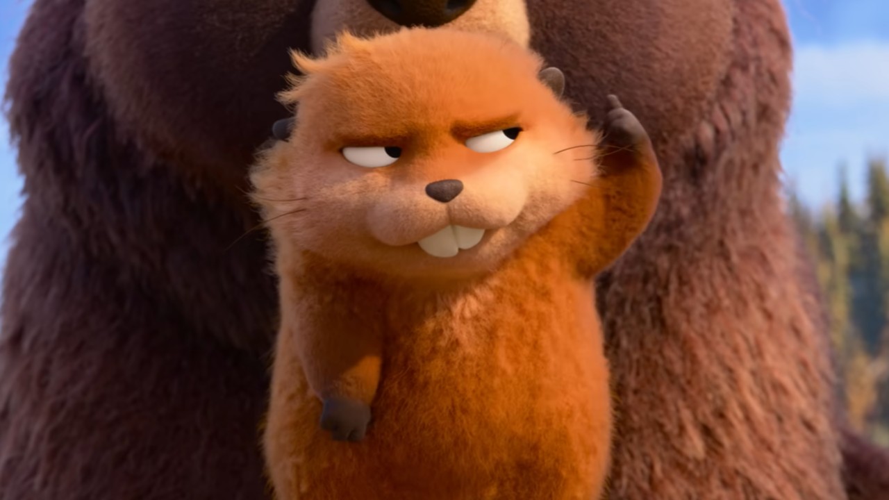 Mabel as a beaver being held by a bear.