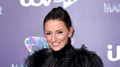 Davina McCall attends "The Masked Singer" photocall at The Mayfair Hotel on December 12, 2019 in London, England