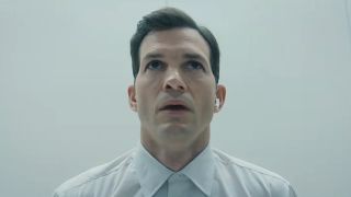 The Corporation in elevator wearing white shirt in The Beauty Season 1