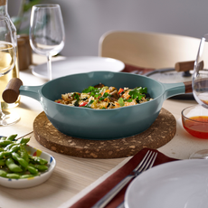 IKEA KLIPPFISK pan filled with rice on a dining table.