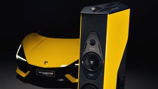 Sonus Faber Il Cremonese Ex3me – Automobili Lamborghini Edition speakers in front of a yellow Lamborghini