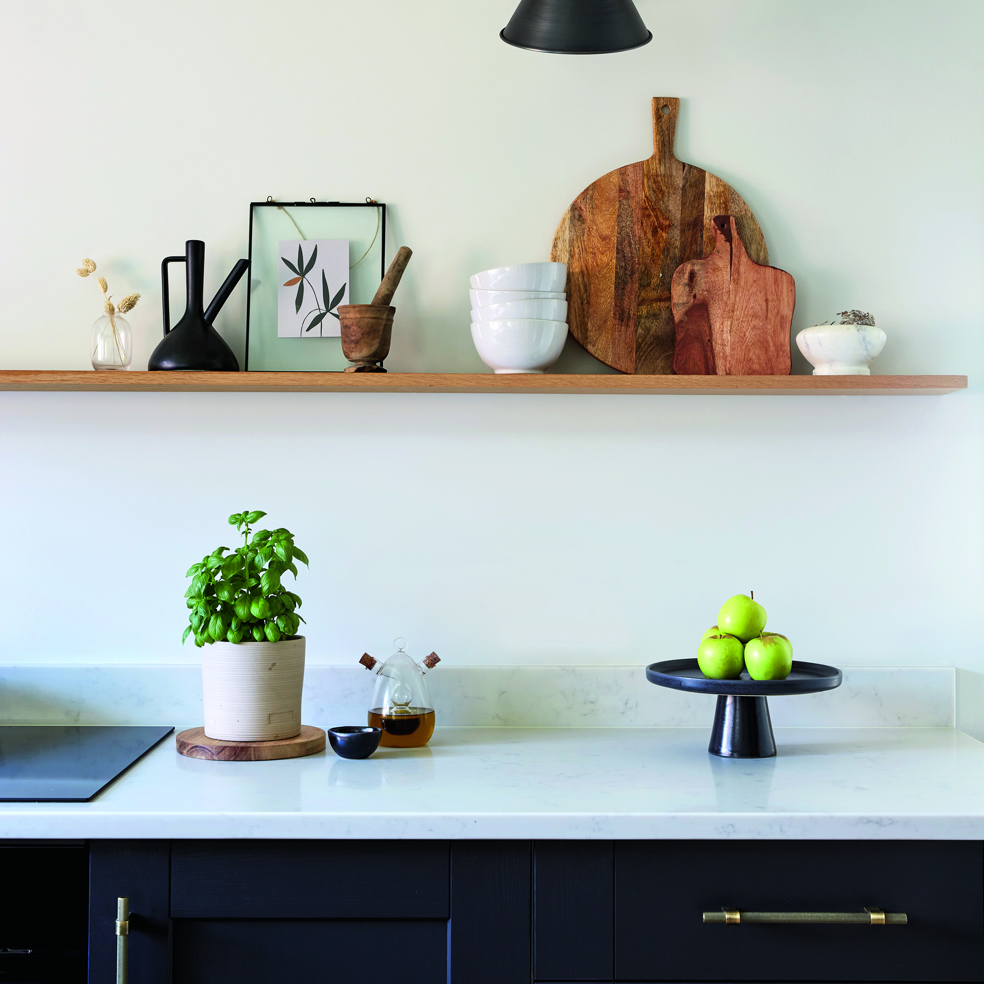 Kitchen with open shelving and mango wood accessories