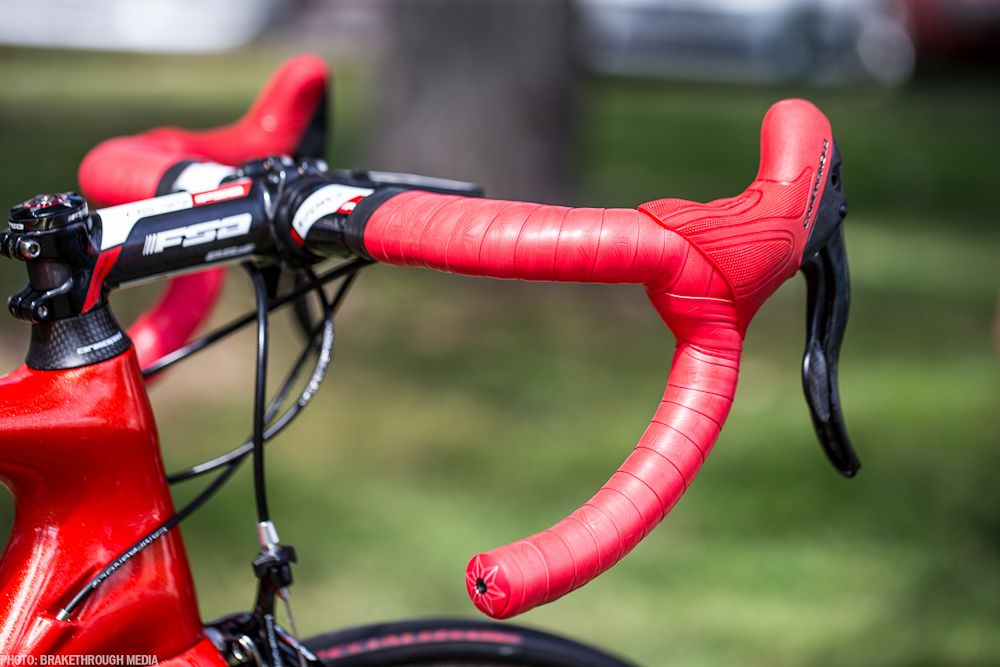 Red bar tape and hoods for Aru to complement his red frame
