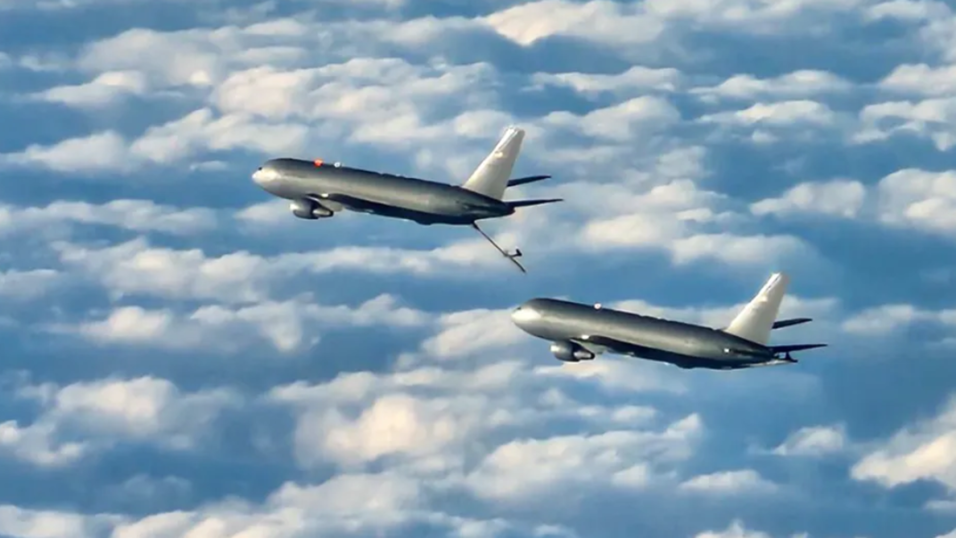 A KC-46A Pegasus tanker practices refueling operations on another KC-46A