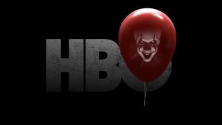 Pennywise's face on a red balloon floating out of HBO Logo for IT: Welcome to Derry Season 1