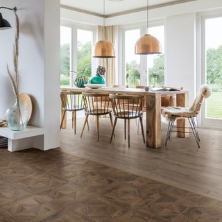 Open plan kitchen dining room with different flooring