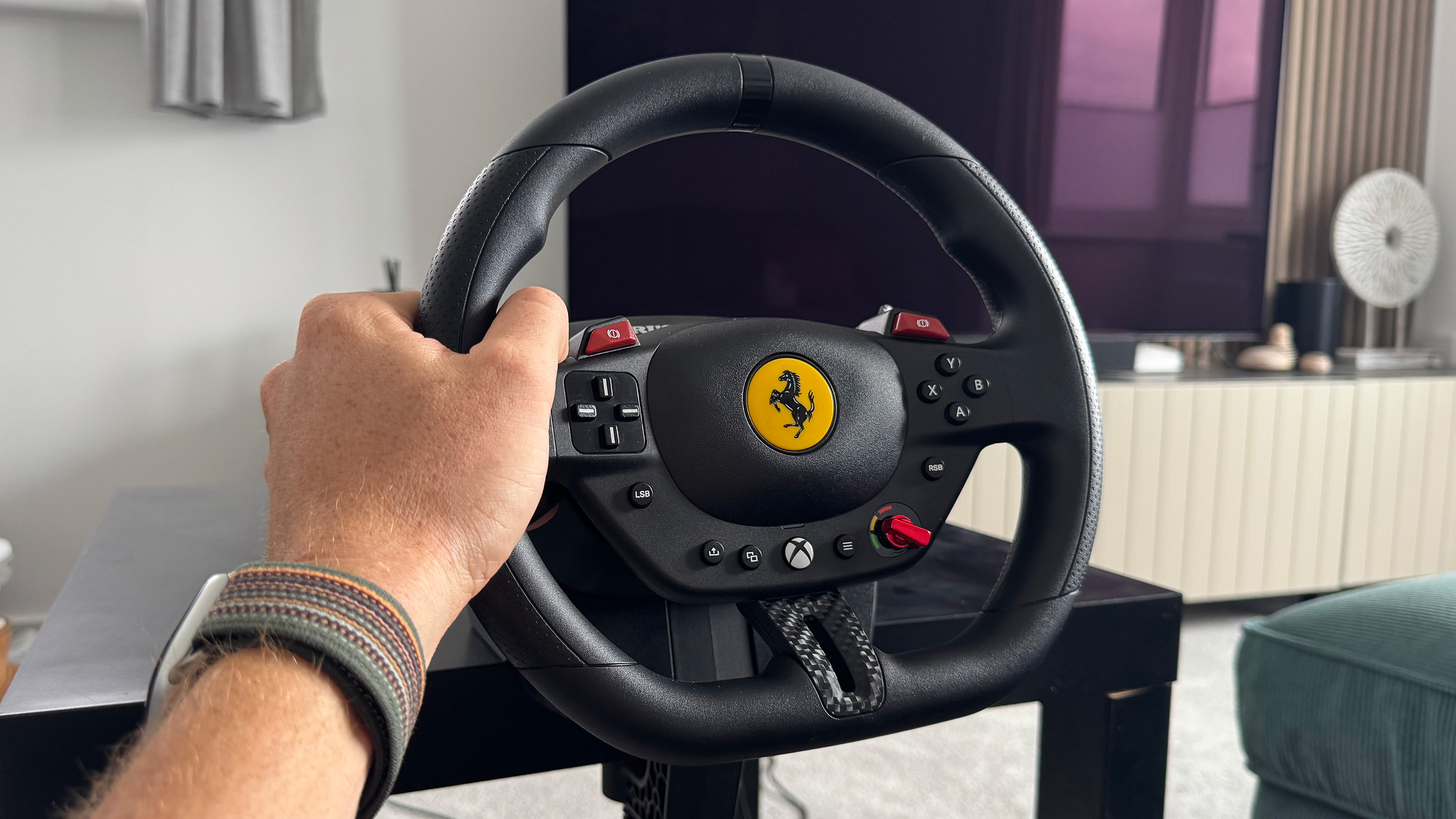 The Thrustmaster T248R in use.