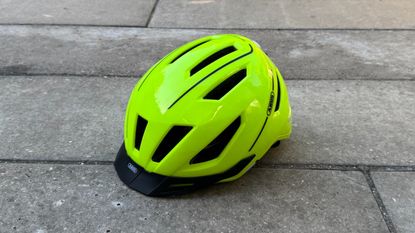The Abus Pedelec 2.0 MIPS helmet on a paved area