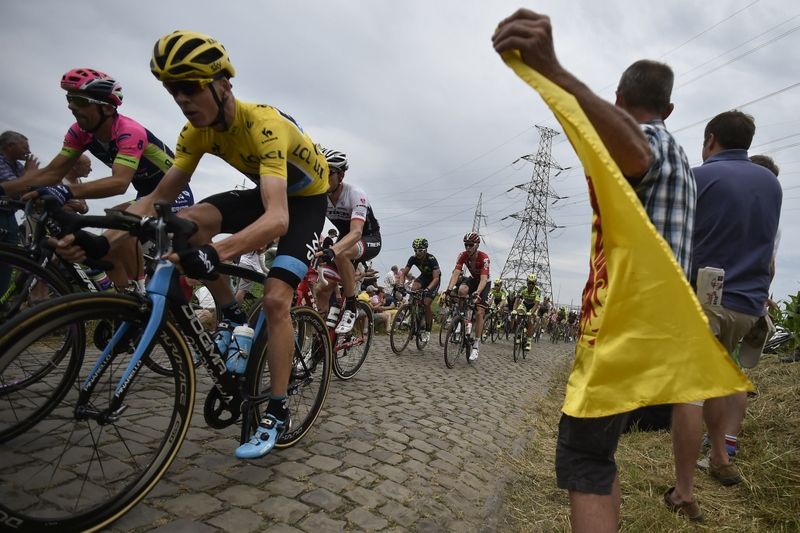 Chris Froome on the first of the cobbles