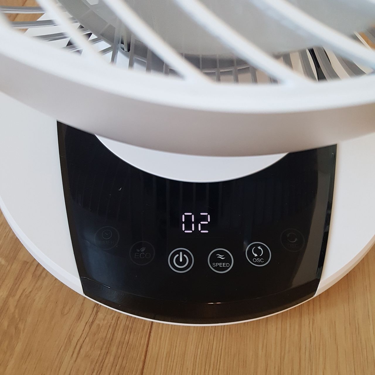 The MeacoFan 1056 Air Circulator fan's digital control panel showing white numbers on a black background