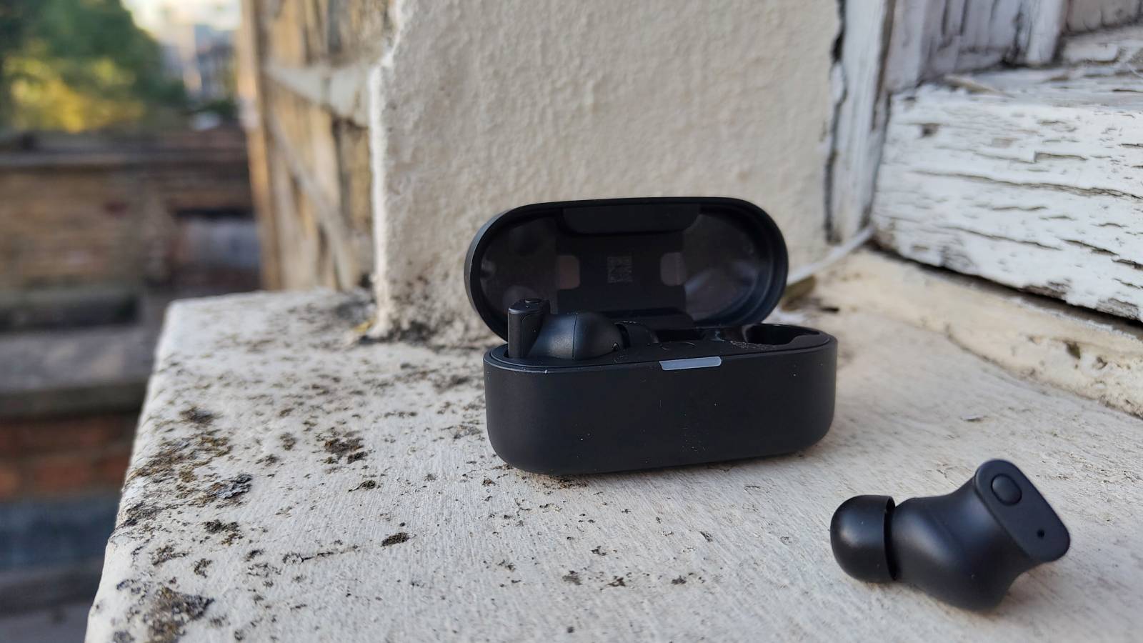 The Status Audio Pro X on a window sill.