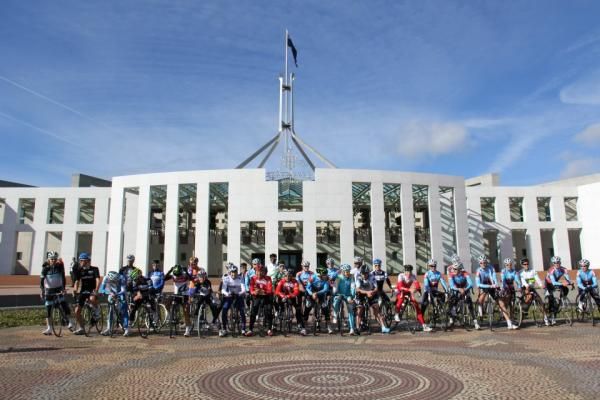 The men's and women's GreenEdge squads infront of Australian Parliament House