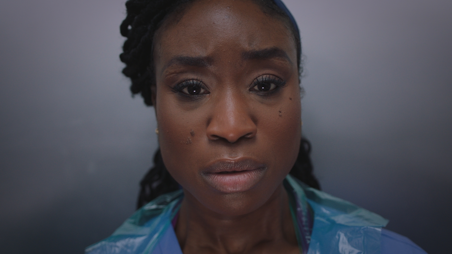 A close up of Ngozi looking scared.