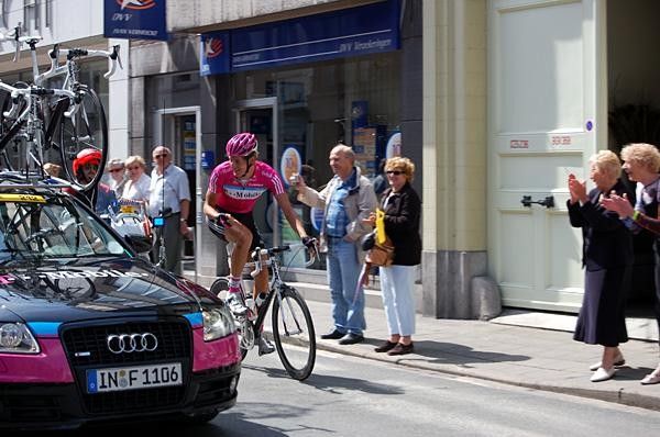 Marcus Burghardt (T-Mobile) drops back to the team car early, in the neutral rollout.