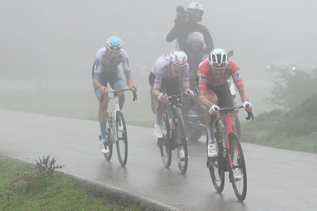 LAGOS DE COVADONGA SPAIN SEPTEMBER 03 LR Pavel Sivakov of France and UAE Team Emirates and Ben OConnor of Australia and Team Decathlon AG2R La Mondiale Red Leader Jersey compete during the La Vuelta 79th Tour of Spain 2024 Stage 16 a 1815km stage Luanco to Lagos de Covadonga 1069m UCIWT on September 03 2024 in Lagos de Covadonga Spain Photo by Tim de WaeleGetty Images