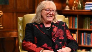 Donna Kelce sitting in a chair.