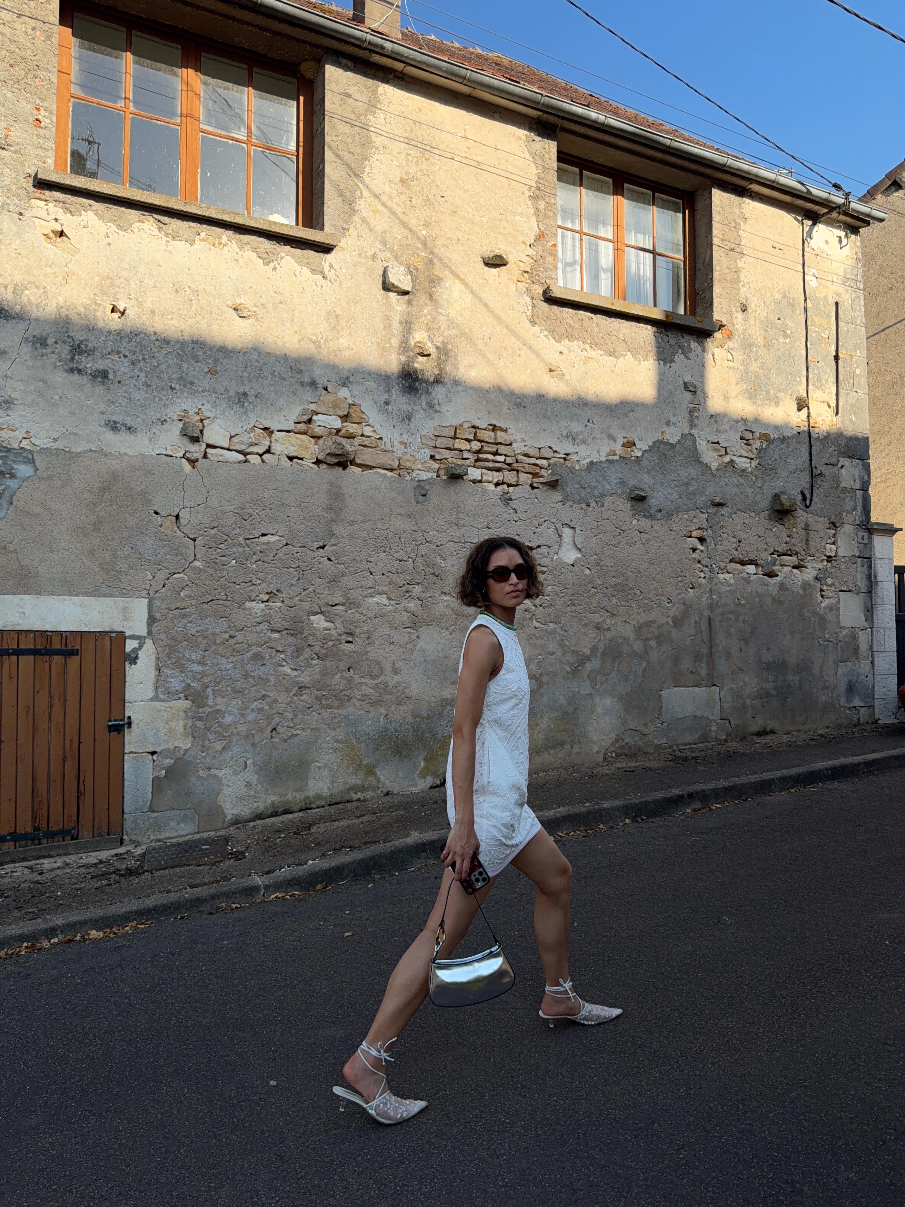 An image of a woman wearing lace up sandal outfit summer 2026