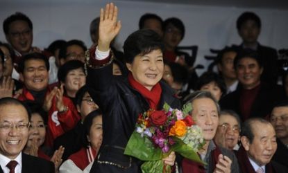 South Korean President-elect Park Geun-Hye celebrates with her historic win on Dec. 19.