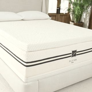Natural Latex Mattress Topper on a bed.