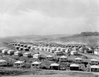 Small and simple homes under construction at Oak Ridge, Tennessee, 1945.