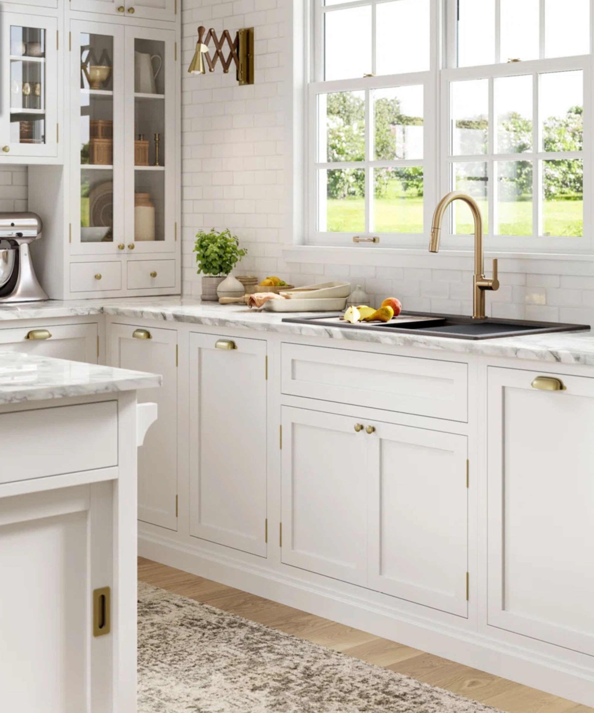 Wayfair white kitchen with a brass Kraus faucet