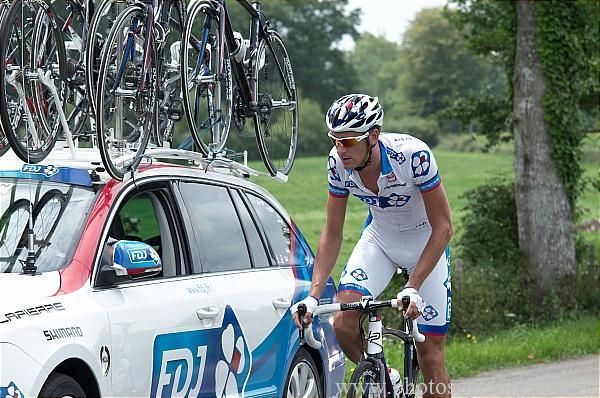 Anthony Roux (FDJ) drops back for a chat at his team car.