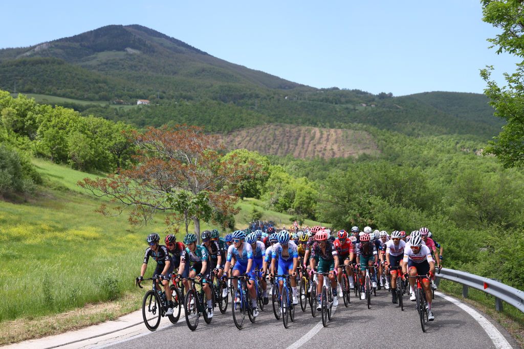 POTENZA ITALY MAY 13 Lawson Craddock of United States Michael Hepburn of Australia and Team BikeExchange Jayco Magnus Cort Nielsen of Denmark and Team EF Education Easypost Dario Cataldo of Italy and Team Trek Segafredo lead the peloton and the peloton passing through Viggiano 1023m during the 105th Giro dItalia 2022 Stage 7 a 196km stage from Diamante to Potenza 717m Giro WorldTour on May 13 2022 in Potenza Italy Photo by Michael SteeleGetty Images