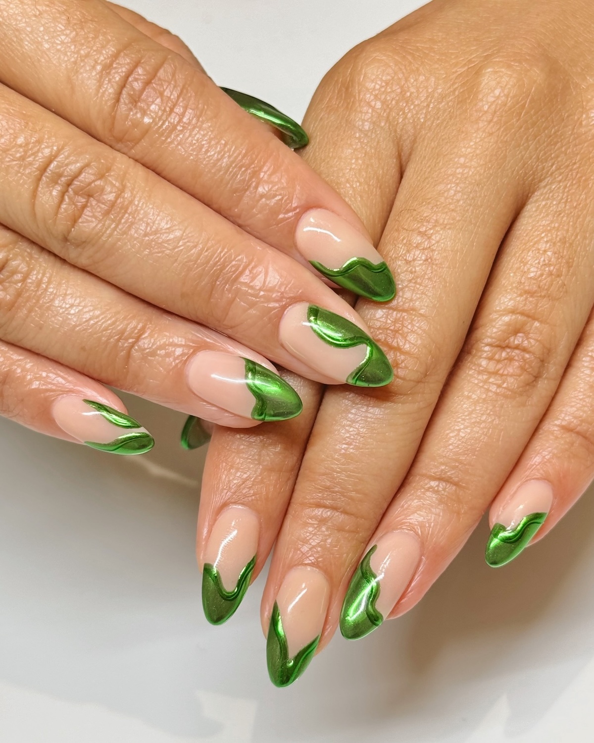Metallic green manicure