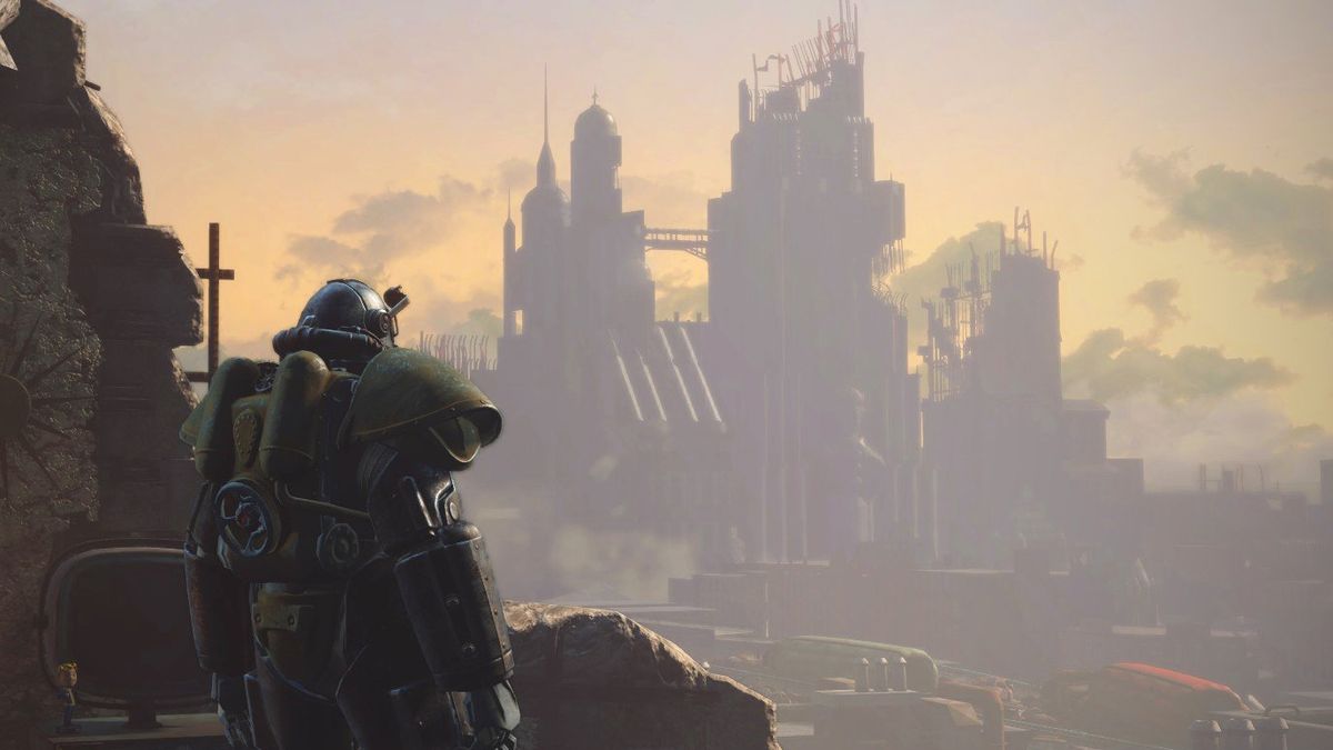 A person in power armor looking at a city in the distance