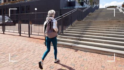 Woman walking up some stone steps outside with sports kit and backpack on, representing exercise snacking