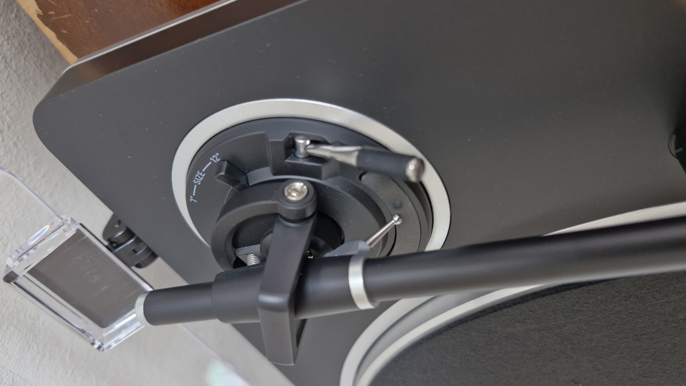 Audio-Technica AT-LP70XBT toggle switch concealed in the turntable's tonearm pivot