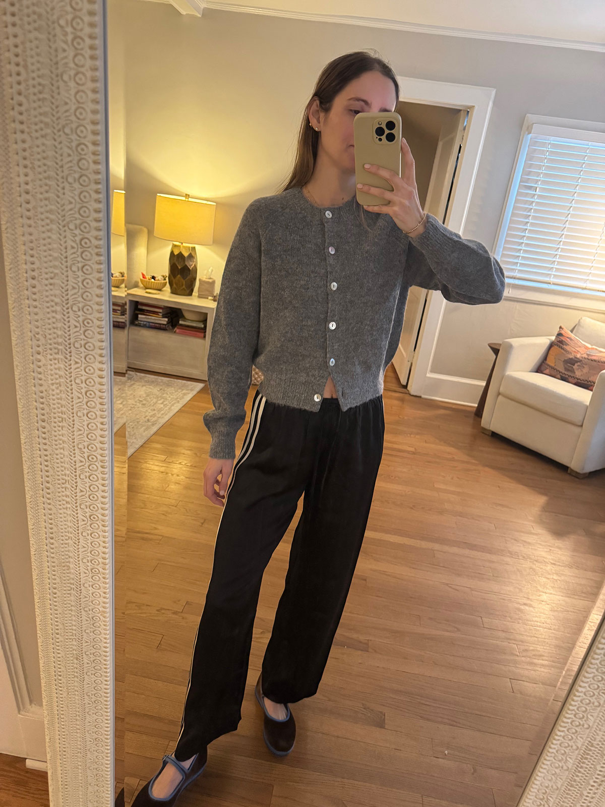 Tessa Faye O'Connell wearing a cardigan sweater.