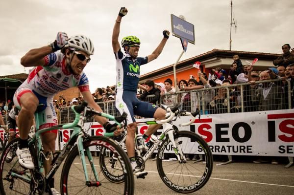 Jose Ventoso raises his arms while Fabio Felline bangs his arms in frustration