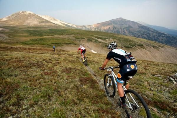 Riders descend quickly before climbing once again to the summit of the race.