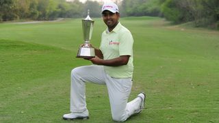 Anirban Lahiri with the trophy after winning the 2015 Indian Open