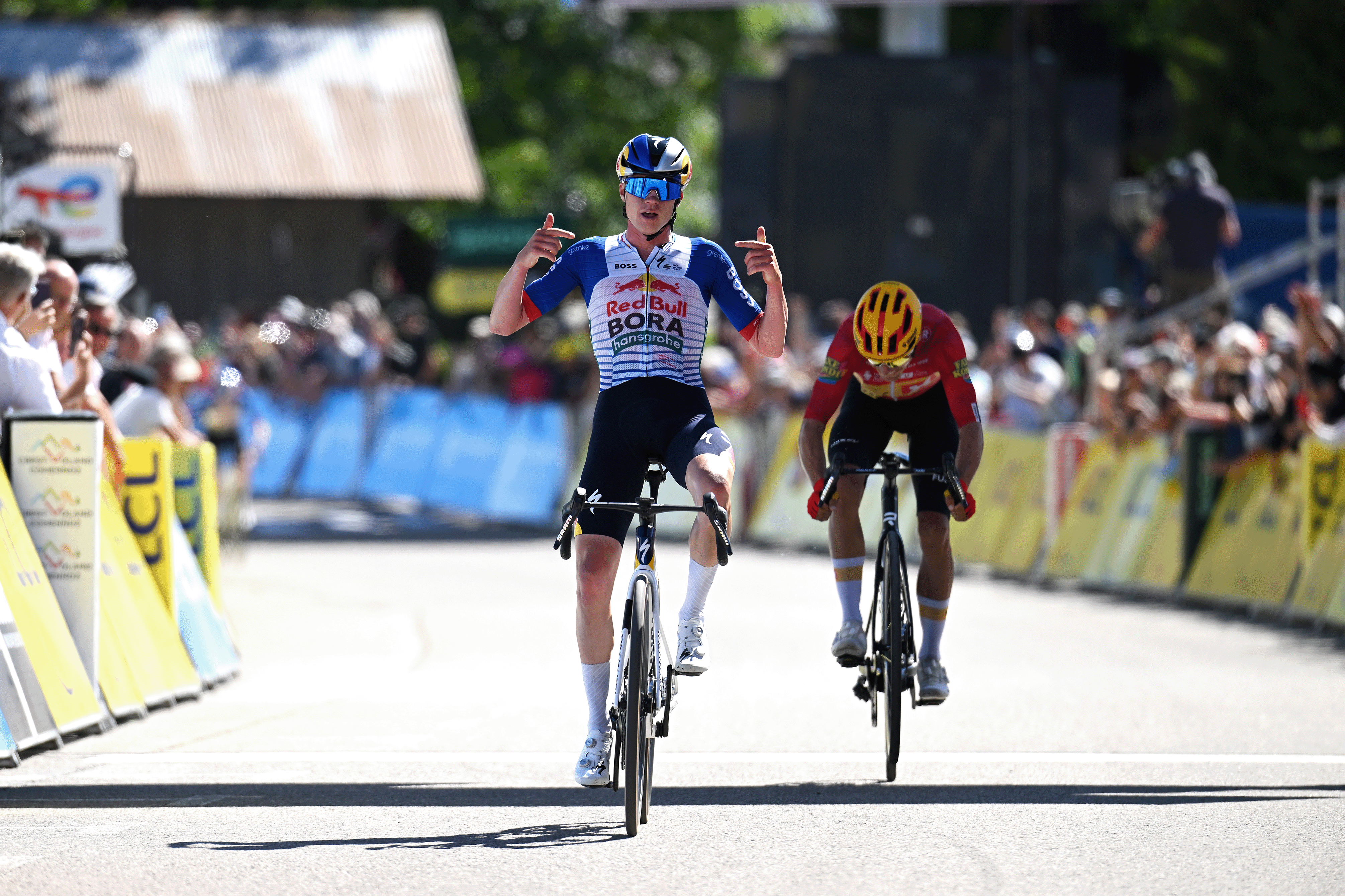 CREST-VOLAND, FRANCE - JUNE 12: (L-R) Maxim Van Gils of Belgium and Team Red Bull - BORA - hansgrohe celebrates at finish line as stage winner ahead of Tobias Halland Johannessen of Norway and Team Uno-X Mobility during the 78th Tour Auvergne-Rhone-Alpes 2026, Stage 6 a 182.3km stage from Saint-Vulbas to Crest-Voland 1211m / #UCIWT / on June 12, 2026 in Crest-Voland, France. (Photo by Dario Belingheri/Getty Images)