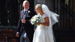 Zara and Mike Tindall after their wedding at Canongate Kirk on July 30, 2011