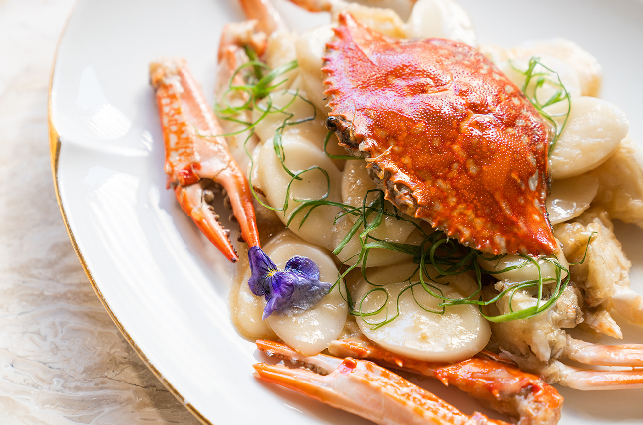 The popular crab and rice cake dish at Cheli, London. Credit: Cheli