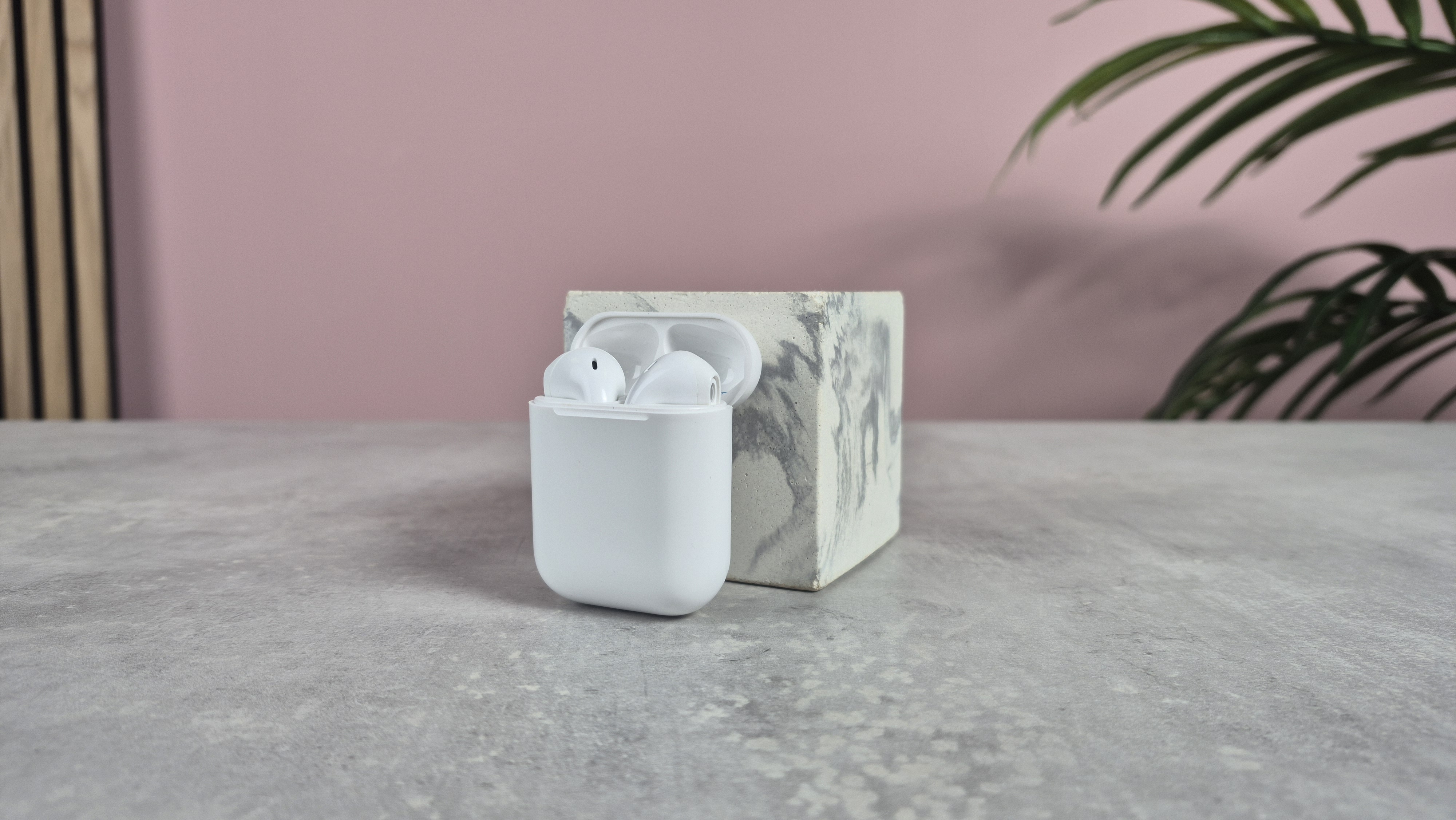 Cheap wireless earbuds balanced against block