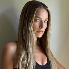 Margot Robbie attended her first a Big Bold Beautiful Journey press event in a little black Stella McCartney dress